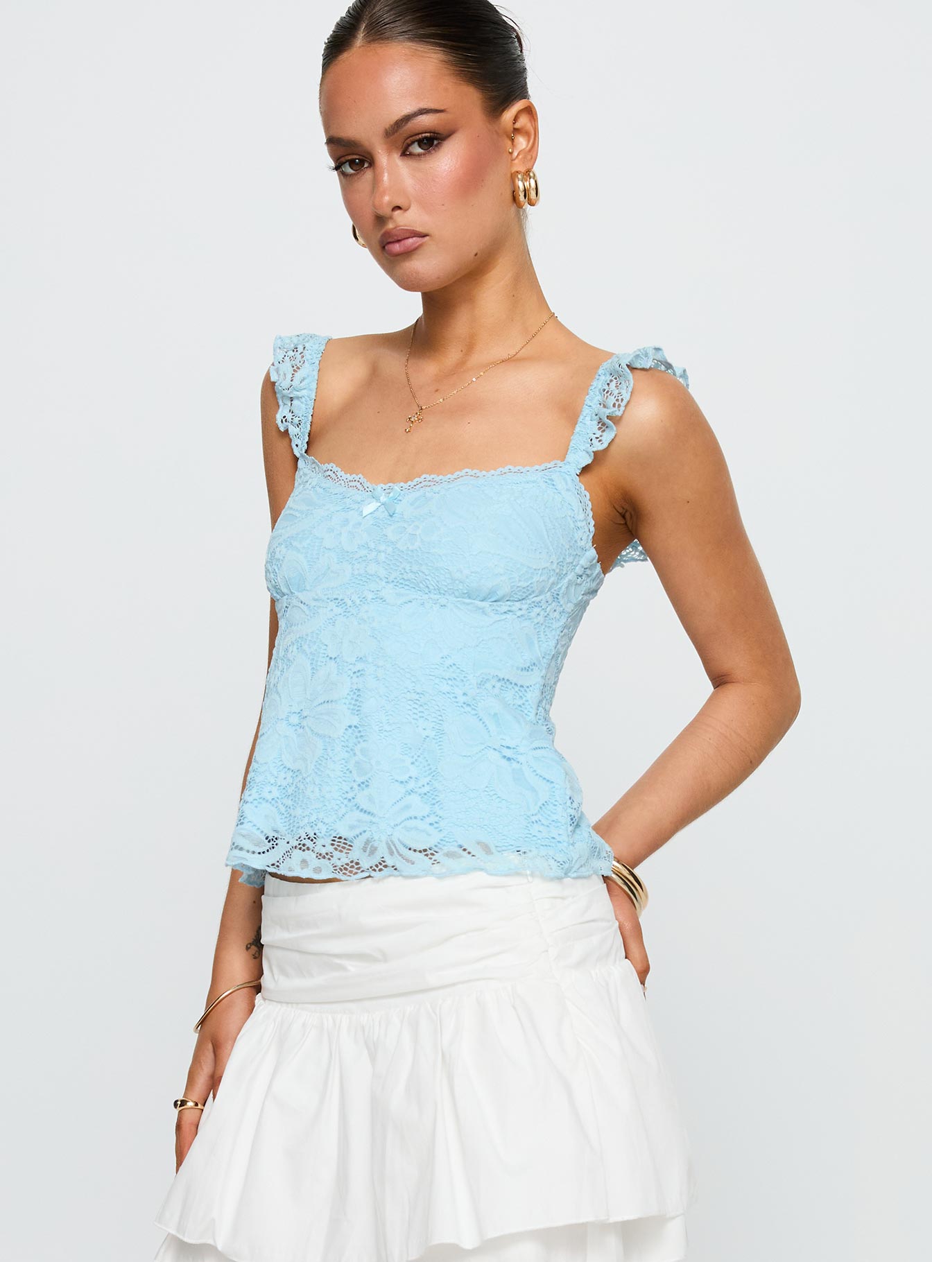 side view of model wearing Princess Polly Madaleine Lace Top Blue Sleeveless Scoop Neck 