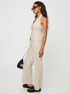 Matching linen set Halter neck top, fixed halter strap, button fastening at front, twin hip pockets High rise pants, belt looped waist, zip and button fastening, elasticated waistband at back, twin hip pockets, straight leg