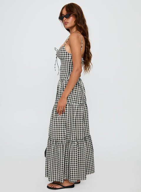 side view of model wearing Princess Polly Avaleine Tiered Maxi Dress Black / White Check Sweetheart Neckline 