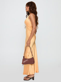 side view of model wearing Princess Polly Good For You Halter Maxi Dress Orange Plunger 