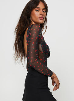 side view of model wearing Princess Polly Lamaro Long Sleeve Bodysuit Black / Red Floral Full Sleeves Sweetheart 
