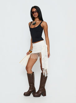   side view of model wearing Princess Polly Winita Macrame Tassel Mini Skirt Cream Mini Skirts 