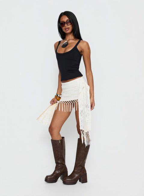   side view of model wearing Princess Polly Winita Macrame Tassel Mini Skirt Cream Mini Skirts 