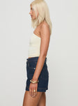 side view of model wearing Princess Polly Heuston Denim Skort Dark Wash Lower Impact High Waisted Shorts 