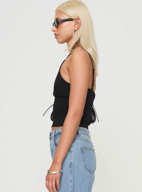 side view of model wearing Princess Polly Arianwen Top Black Sleeveless Crew Neck 