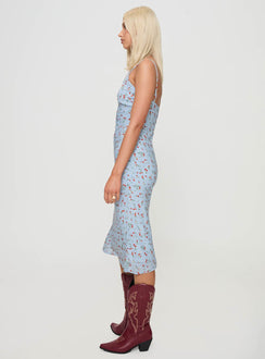 side view of model wearing Princess Polly Forsell Maxi Dress Blue Floral V-Neck 