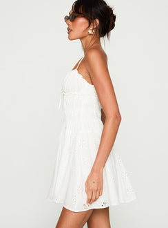 side view of model wearing Princess Polly Wish Me Luck Shirred Mini Dress White Sweetheart Neckline 