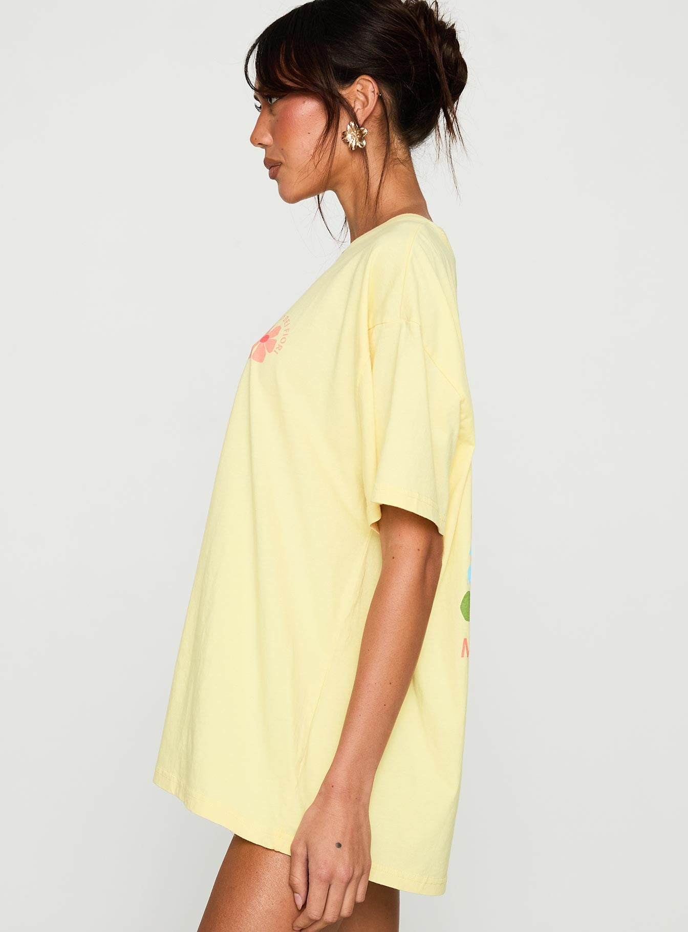 side view of model wearing Princess Polly Firenze Flower Market Graphic Top Yellow Half Sleeves Crew Neck 