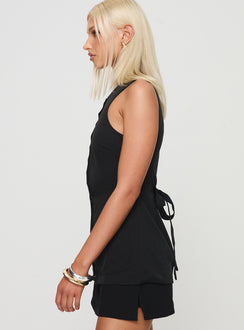 side view of model wearing Princess Polly Mystick Vest Top Black Sleeveless Crew Neck 