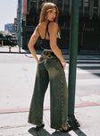 back view of model wearing Princess Polly Ribbon Stamp Wide Leg Jeans Antique Wash Petite Low Rise Jeans 