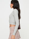 side view of model wearing Princess Polly Tinkla Long Sleeve Top Grey Full Sleeves High Neck 