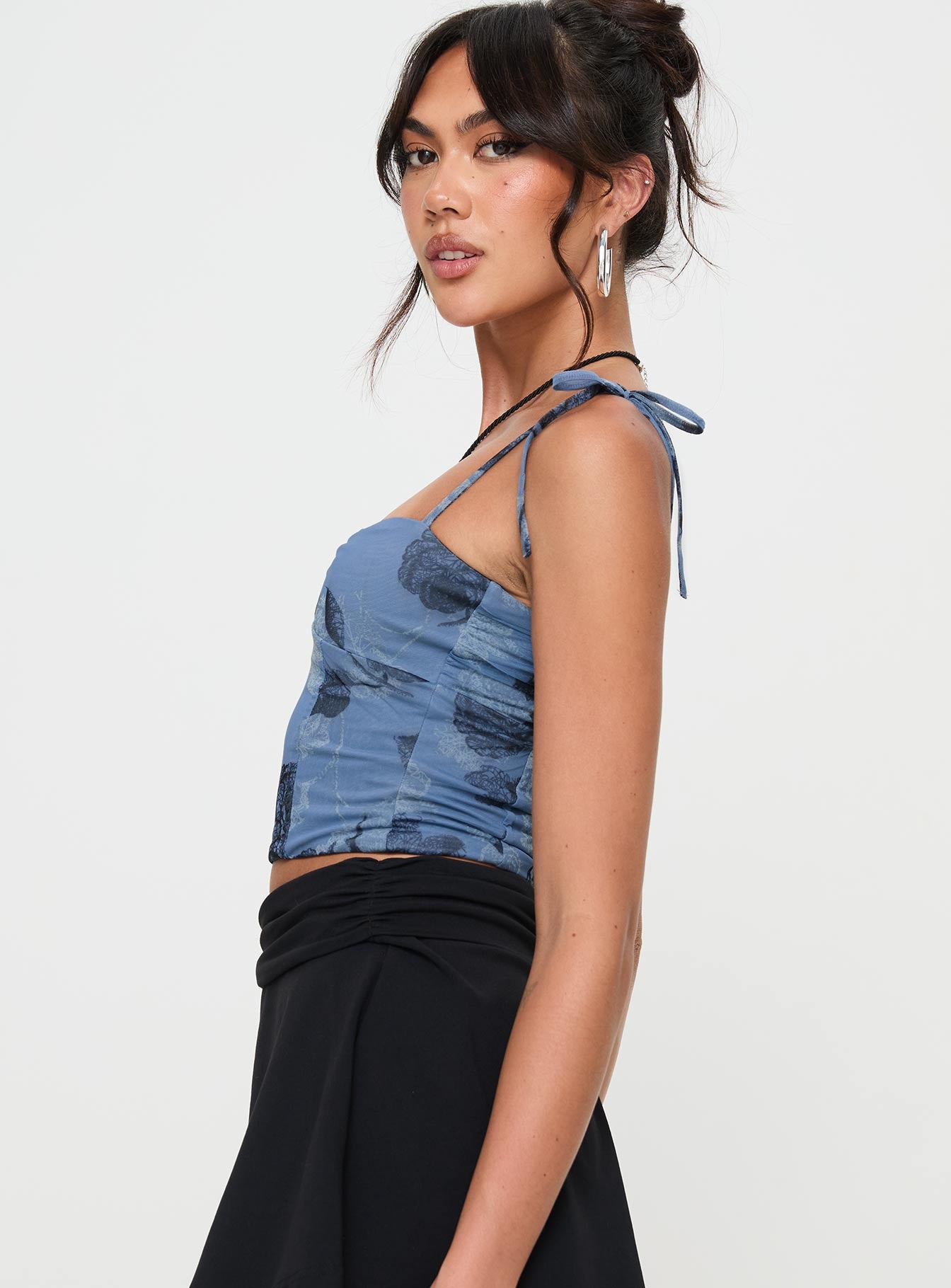 side view of model wearing Princess Polly Over You Top Blue Sleeveless Square Neck 