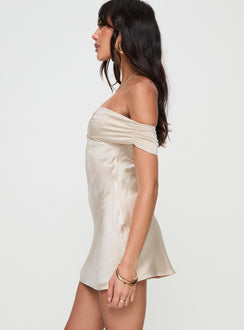 side view of model wearing Princess Polly Sadee Mini Dress Champagne Straight Neck 