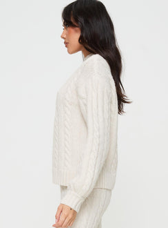 side view of model wearing Princess Polly Sharif Cable Knit Sweater Beige regular 
