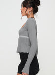 side view of model wearing Princess Polly Noir Long Sleeve Top Grey Full Sleeves Square Neck 