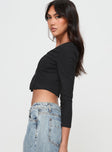 side view of model wearing Princess Polly Time Is Up Long Sleeve Top Black Full Sleeves V-Neck 