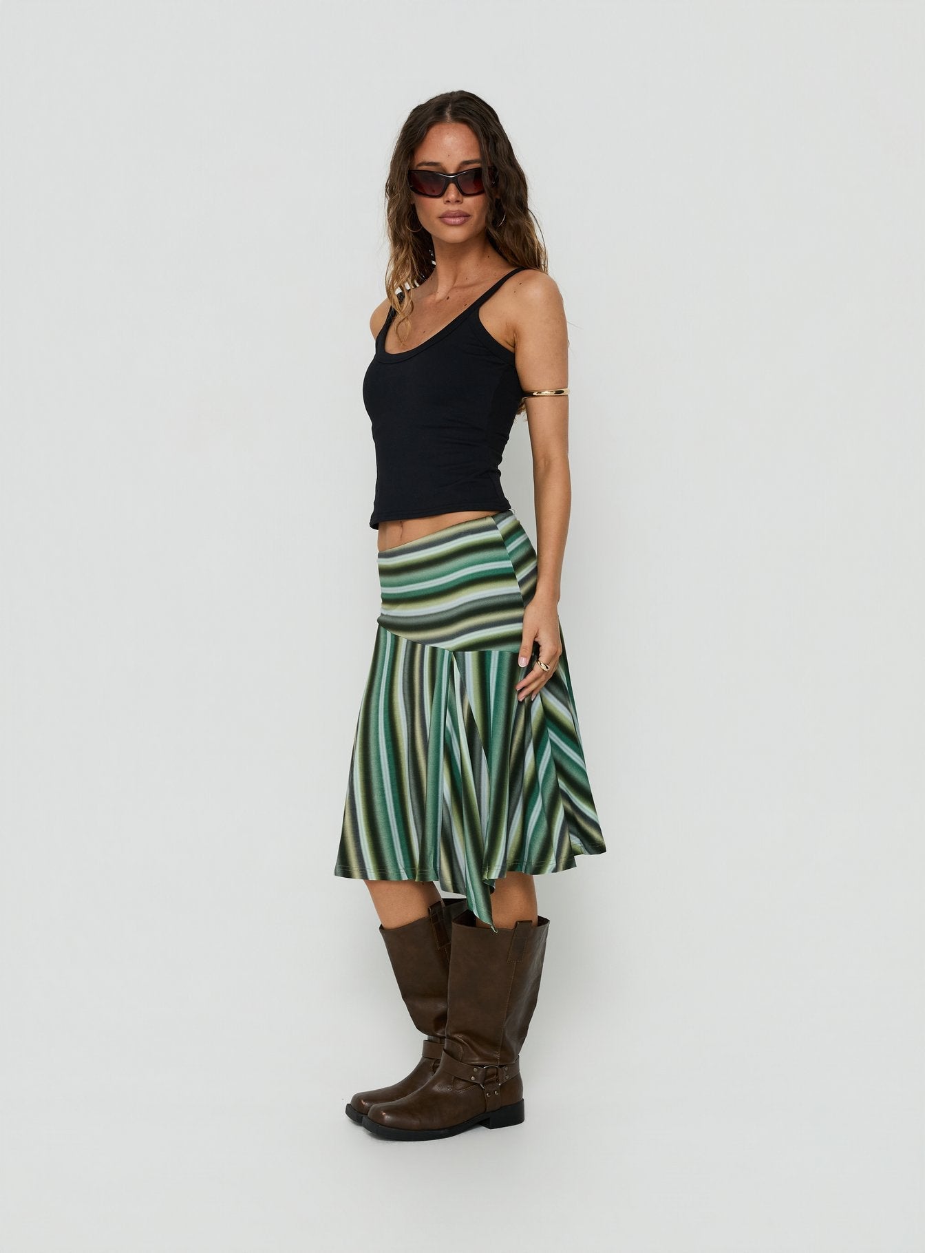Designed with Desidera Asymmetrical Midi Skirt Blue Multi Stripe womens-skirts featuring flared fitted shape side view of model wearing Princess Polly