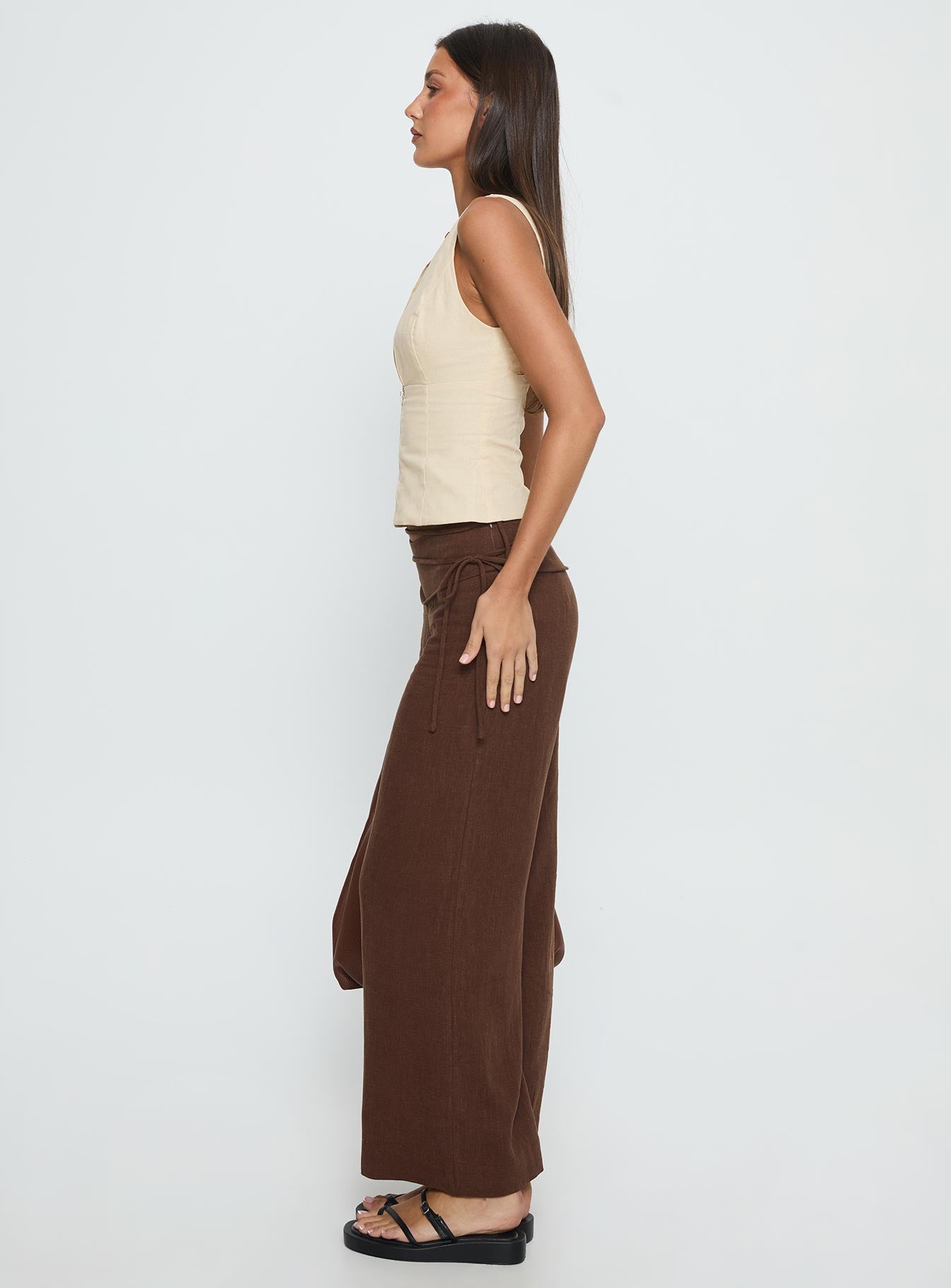 side view of model wearing Princess Polly Silver Moon Linen Blend Tie Pants Brown Mid Rise Pants 