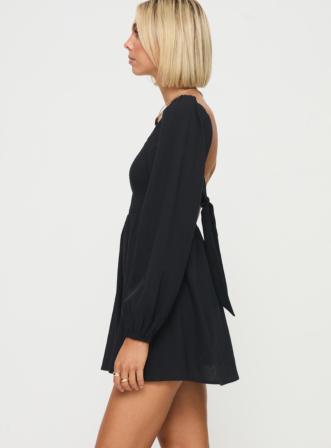 side view of model wearing Princess Polly Summer Nights Long Sleeve Mini Dress Black Square Neck 