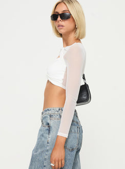 side view of model wearing Princess Polly Middleton Long Sleeve Top White Full Sleeves Asymmetric Neckline 