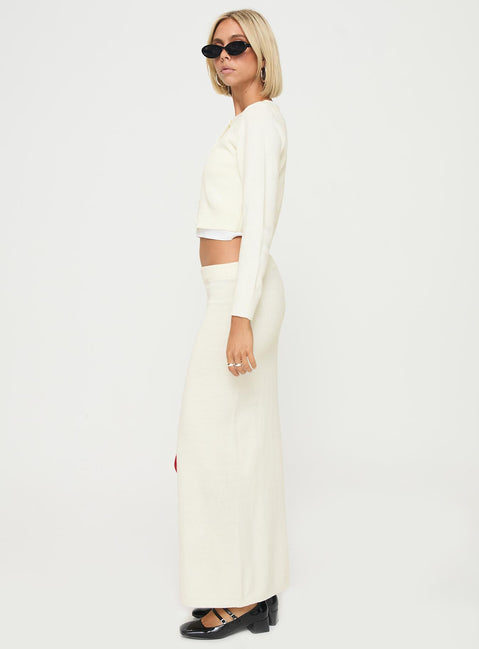   side view of model wearing Princess Polly Collase Knit Maxi Skirt Cream Maxi 