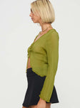 Long sleeve top Plisse material, flared sleeve, twin tie fastening at front, split hem Good stretch, unlined