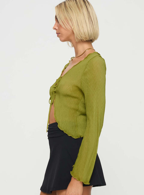 side view of model wearing Princess Polly Undone Long Sleeve Top Green Full Sleeves Scoop Neck 