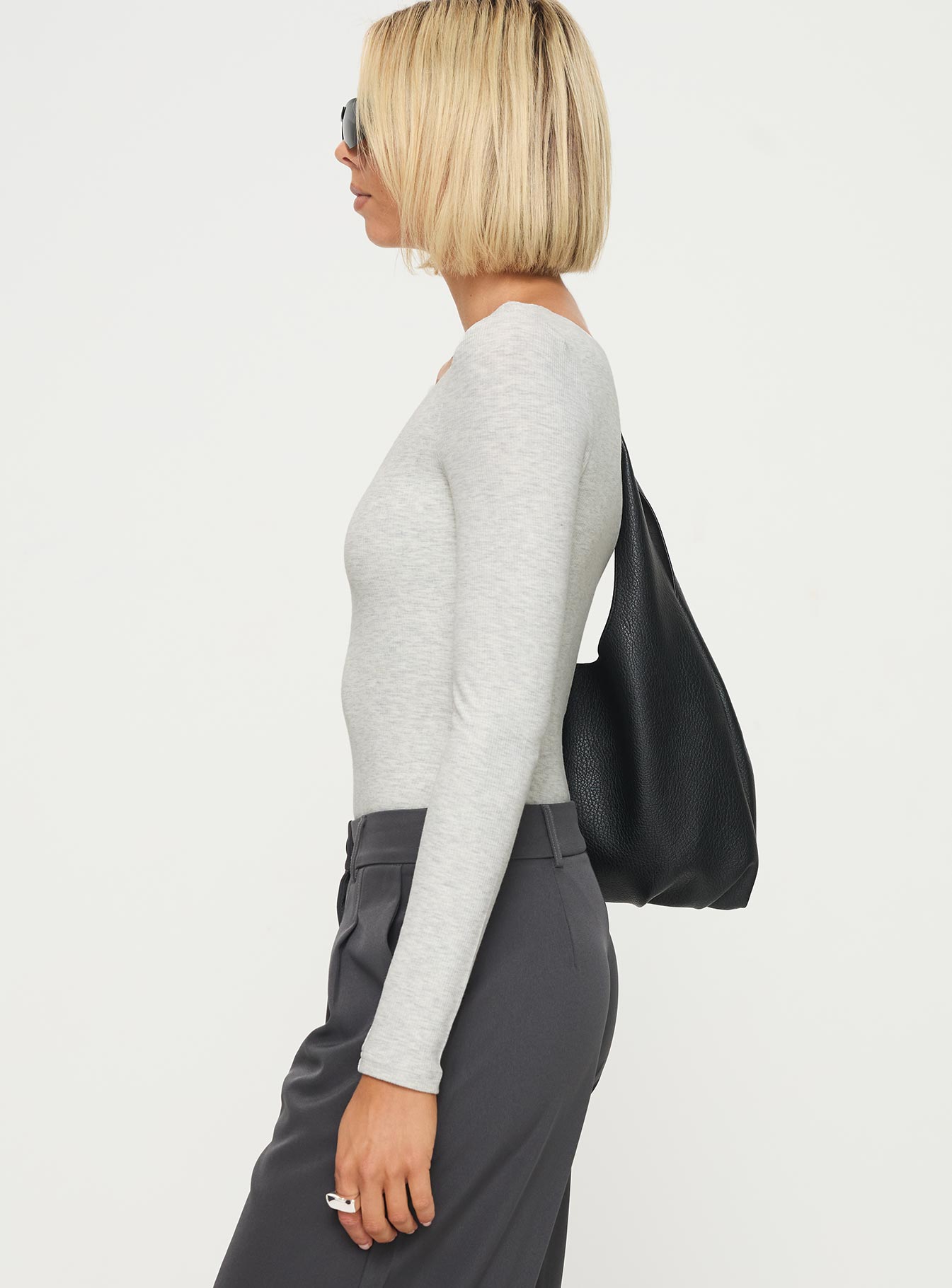 side view of model wearing Princess Polly Greener Long Sleeve Bodysuit Grey Full Sleeves Crew Neck 