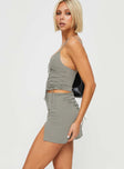   side view of model wearing Princess Polly Untouched Lace Up Mini Skirt Grey Mini Skirts 