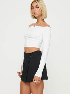   side view of model wearing Princess Polly Lawyer Up Mini Skirt Black Mini Skirts 