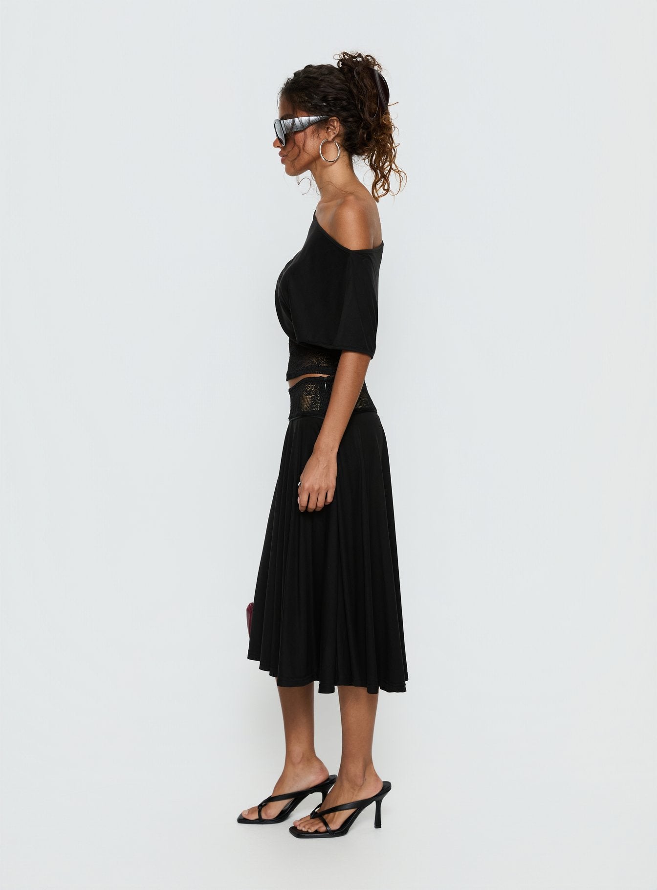   side view of model wearing Princess Polly Marienna Lace Midi Skirt Black Midi Skirts 