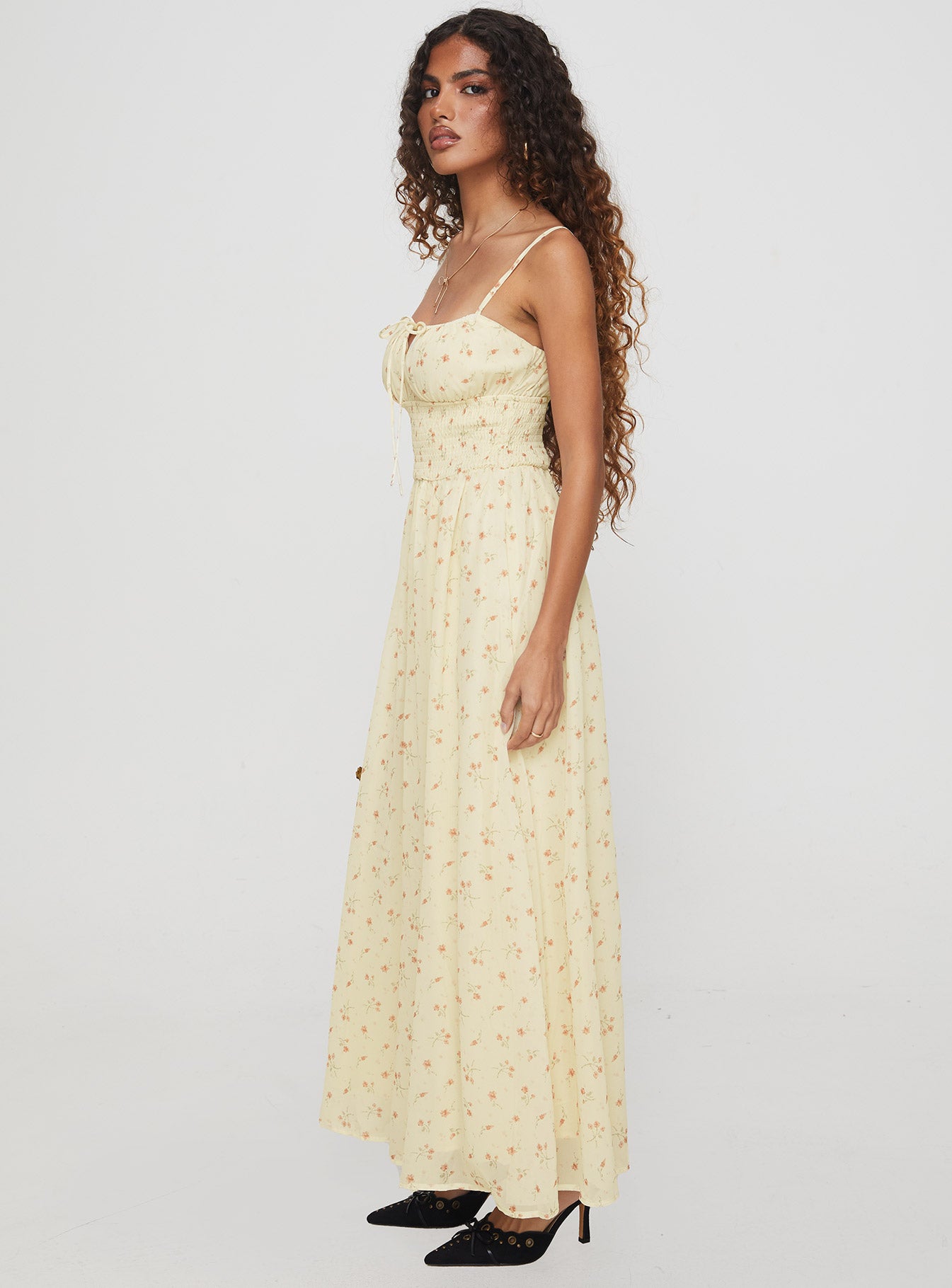 side view of model wearing Princess Polly Pearle Shirred Maxi Dress Cream Floral Square Neck 
