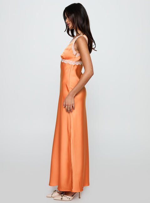 side view of model wearing Princess Polly Natassja Maxi Dress Orange V-Neck 