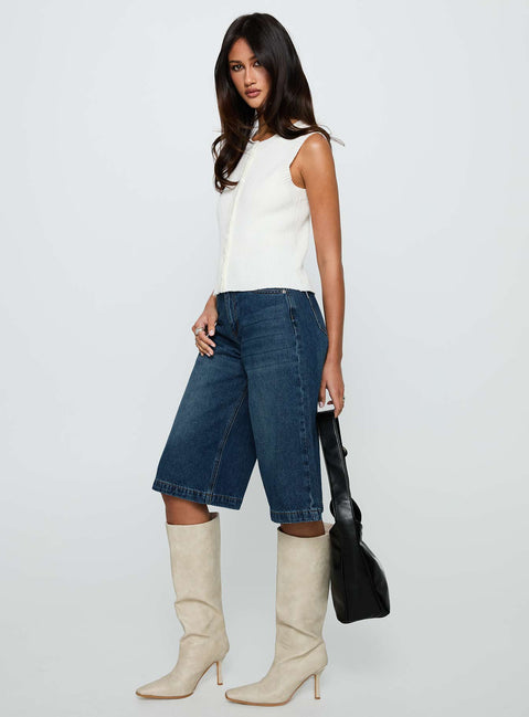 side view of model wearing Princess Polly Simie Button Front Rib Top White Sleeveless Crew Neck 