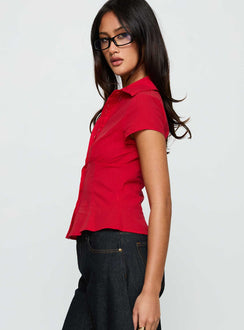 side view of model wearing Princess Polly Cottesloe Blouse Top Red Short Sleeves V-Neck 