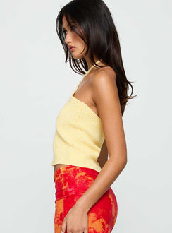 side view of model wearing Princess Polly Runaway Baby Top Lemon Sleeveless 