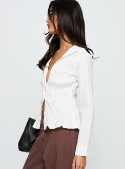 side view of model wearing Princess Polly Cultivate Shirred Long Sleeve Top White Full Sleeves V-Neck 