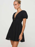 side view of model wearing Princess Polly Raleigh Mini Dress Black Plunger 