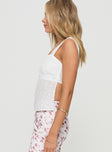 side view of model wearing Princess Polly Missey Top White Sleeveless Square Neck 