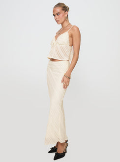   side view of model wearing Princess Polly Jacintha Maxi Skirt Cream Maxi 
