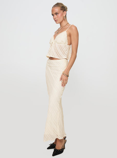   side view of model wearing Princess Polly Jacintha Maxi Skirt Cream Maxi 