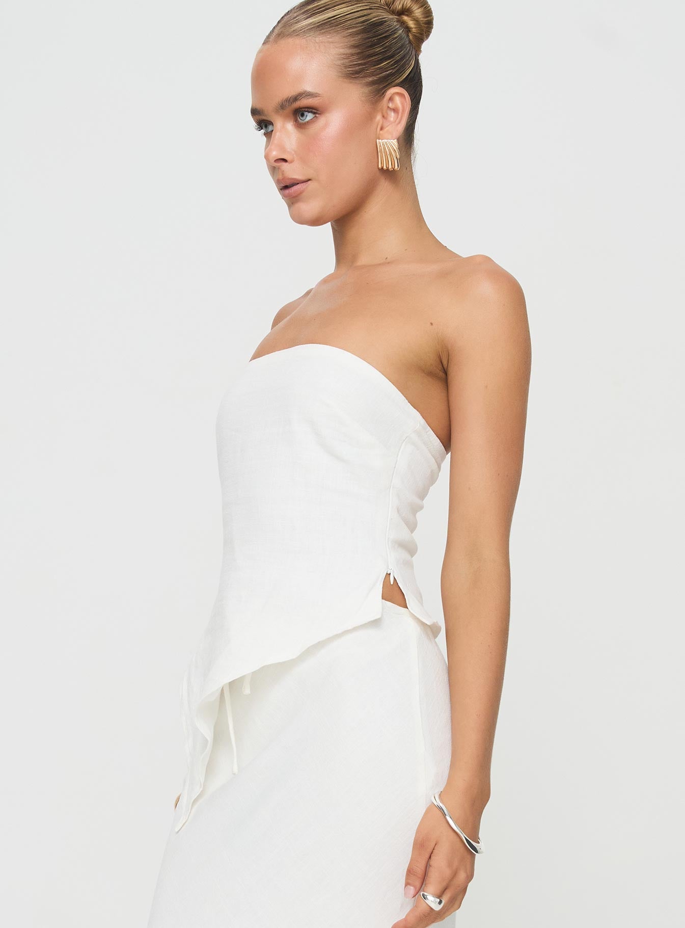 side view of model wearing Princess Polly Birdie Asymmetric Linen Blend Top White Sleeveless straight 