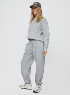 side view of model wearing Princess Polly Dream Fleece Ankle Cuff Sweatpants Grey Marle High Waisted Pants 