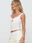 side view of model wearing Princess Polly Boucher Top White Sleeveless V-Neck 