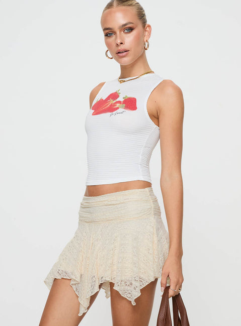   side view of model wearing Princess Polly Lifas Lace Mini Skirt Cream Petite Mini Skirts 