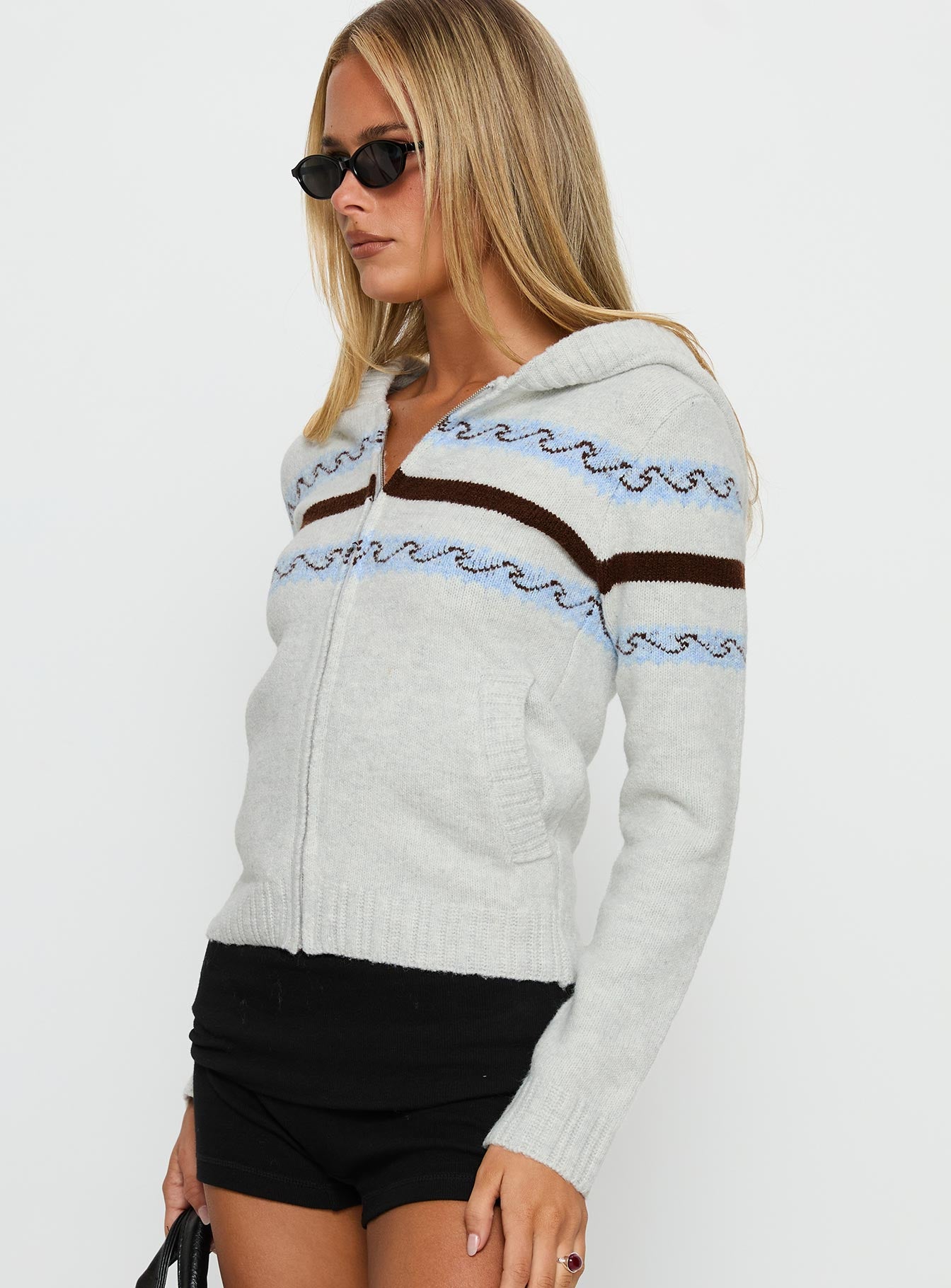 side view of model wearing Princess Polly Zaylina Graphic Zip Through Knit Sweater Grey Cropped Jumpers 