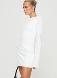 side view of model wearing Princess Polly Carters Long Sleeve Mini Dress White Petite High Neck 