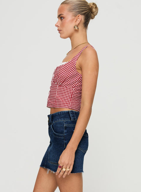   side view of model wearing Princess Polly Reel It In Denim Mini Skirt Dark Wash Mini Skirts 