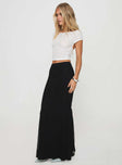   side view of model wearing Princess Polly Topping Maxi Skirt Black Petite Maxi 