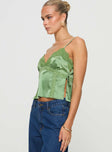 side view of model wearing Princess Polly Isolind Top Apple Green Sleeveless V-Neck 